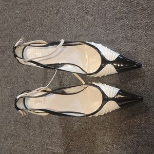 Black and white pointed toe high heels